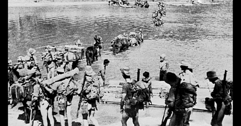 A Chindit group crossing a river in Burma in 1943 as part of Operation Longcloth.