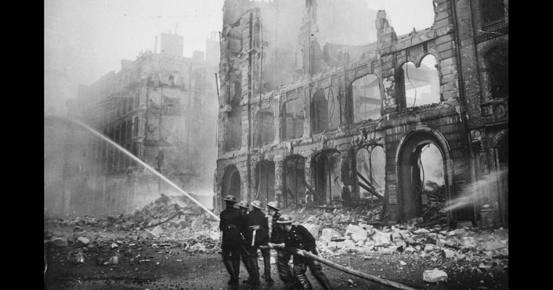 Firefighters putting out a blaze in London after an air raid during The Blitz in 1941.
