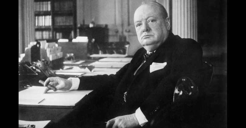 Winston Churchill in the Cabinet Room at Downing Street in London. 