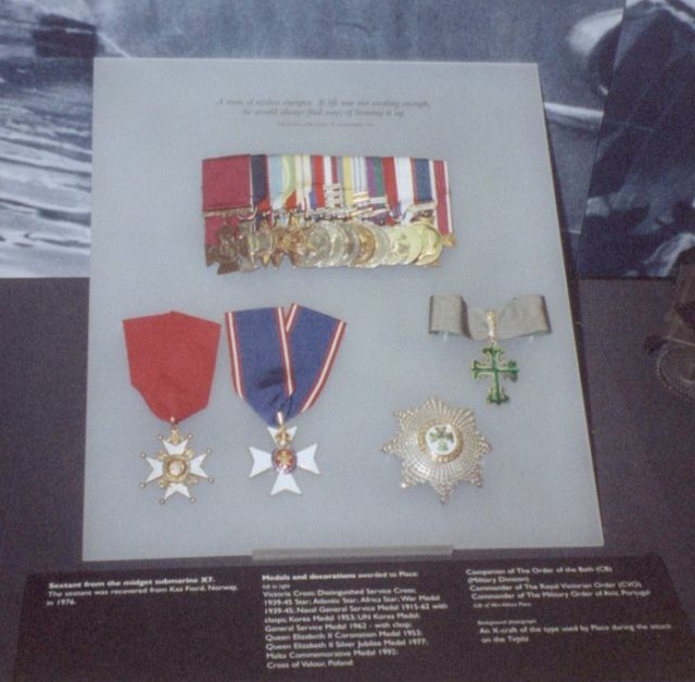 Photograph of B.C.G. Place VC’s medal collection at the Imperial War Museum. By Antoni Chmielowski – CC BY-SA 3.0