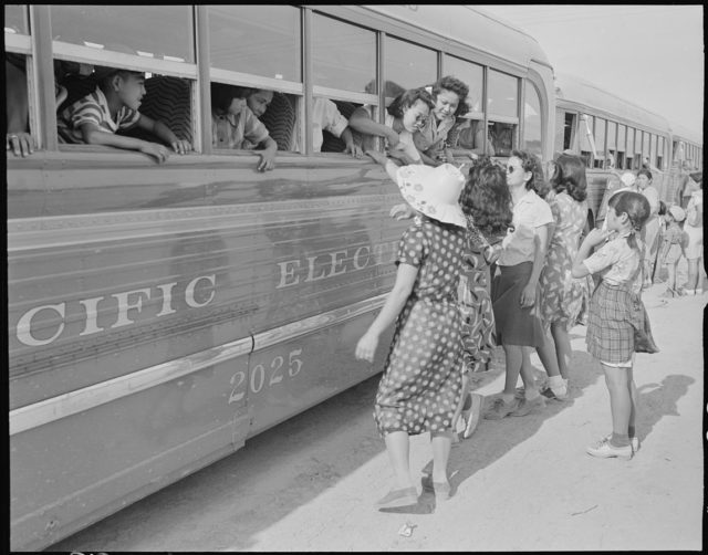 Arrival of evacuees of Japanese ancestry at this War Relocation Authority center.