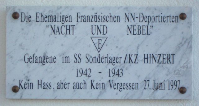 Commemorative plaque for the French victims at Hinzert concentration camp, showing the expressions Nacht und Nebel (Night and Fog) and “NN-Deported” – Photo Credit