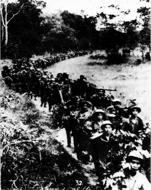 North Vietnamese Army troops marching through Laos in 1967.