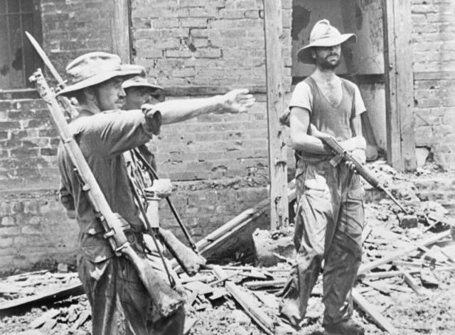 Calvert (left) giving orders during the capture of Mogaung in June 1944.