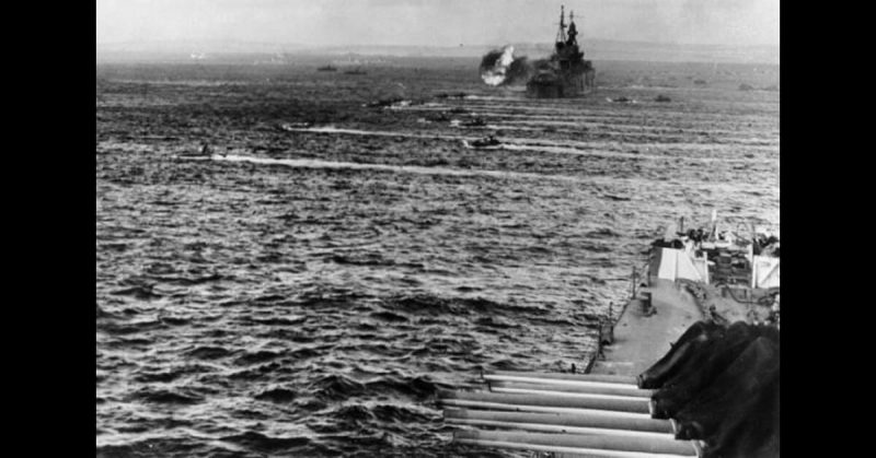 US Navy ships bombarding the beaches of Saipan on June 15, 1944