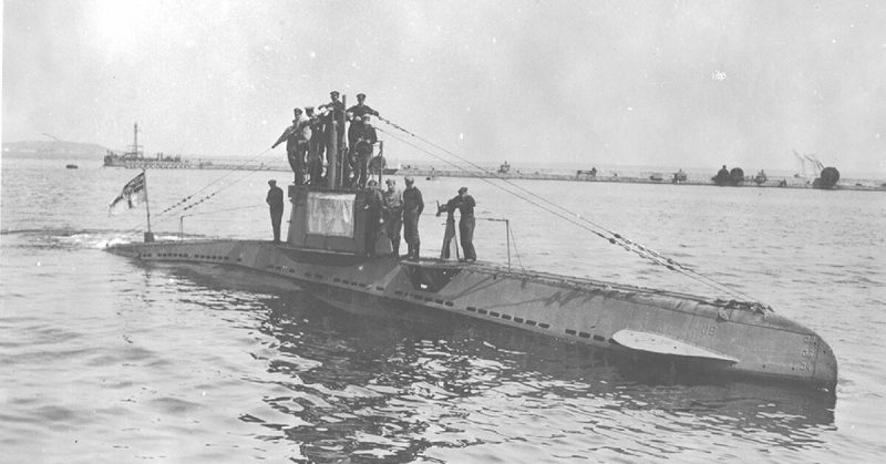 German WWI U-boat UB 14 on the surface of the Black Sea. The submarine's crew is gathered around the tower.