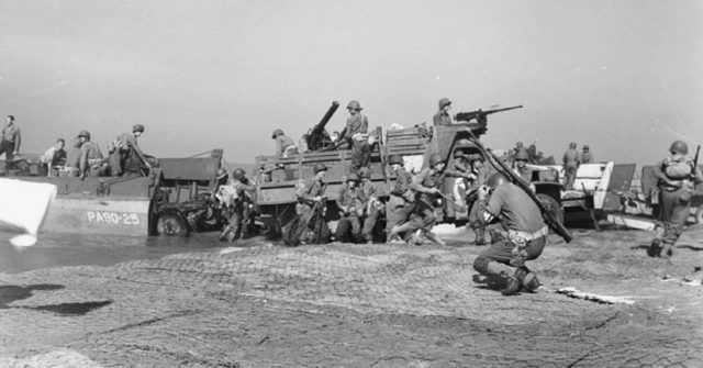 Artillery being landed during the invasion of mainland Italy at Salerno, September 1943.