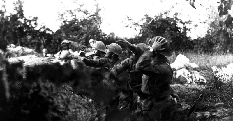 American soldiers hurling hand grenades during WWI. 