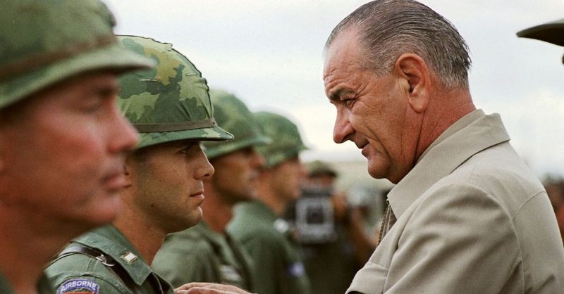 Lyndon Johnson awarding a medal to a US soldier, Vietnam 1966.
