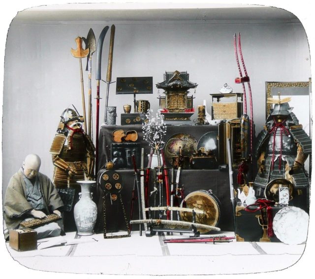 1890s photo showing a variety of armor and weapons typically used by samurai.