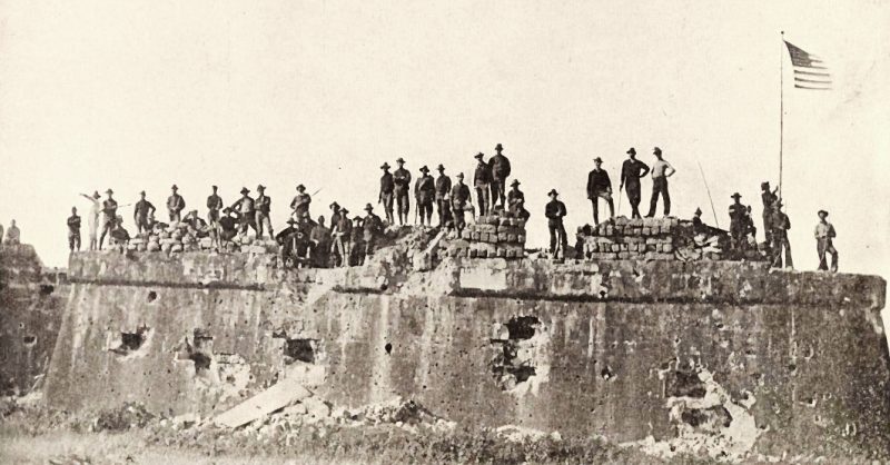 American troops raising the Flag after the Spanish–American War.