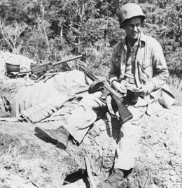 Marine on Guadalcanal resting during a break in the fighting.