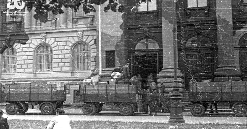 Germans loading trucks with Polish artwork at Zachęta building1944. <a href=”URL TO IMAGE”>Photo Credit</a>