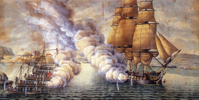 A British frigate giving fire support to a landing party in small boats;