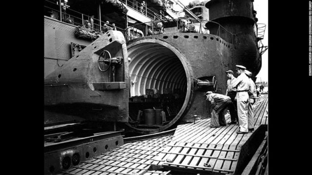 Photo above shows the cavernous hangar of the I-400 Sub that could store the 3 aircraft inside. US sailors had never seen such aircraft carrier submarine of this size and such advanced features. Note also the shark-skin surface of the Monster sub, a High-Tech rubberized coating against sonar detection.