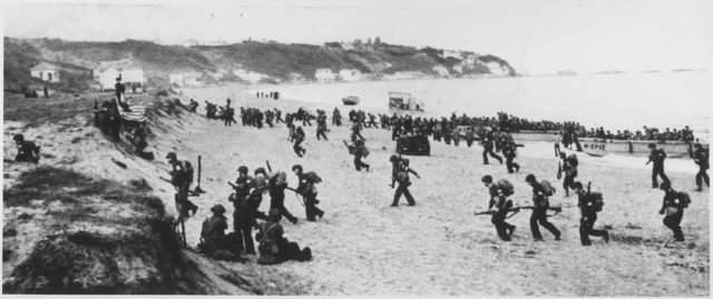 American soldiers storming the beaches near Algiers as part of Operation Torch in November 1942.