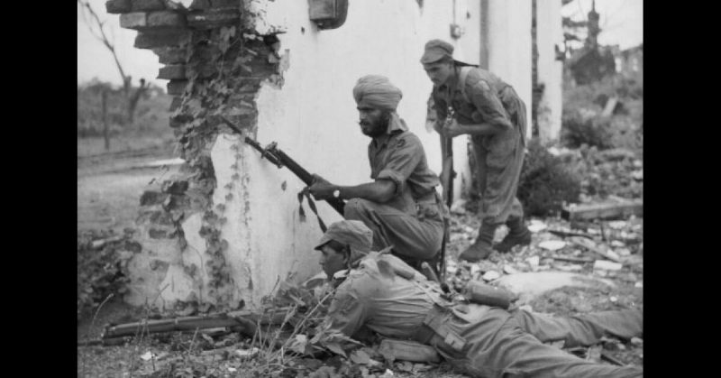 British Indian Army troops of the 20th Division at Pyay, Burma on May 3, 1945, sweeping the city in search of Japanese soldiers.