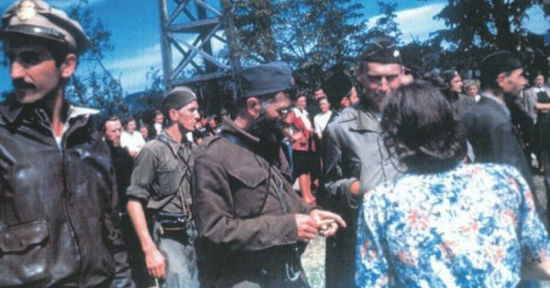 Joint US/Chetnik military ceremony in Pranjani September 6, 1944. Capt. Nick Lalich (OSS Halyard Mission), Gen. Dragoljub Mihailovic (Yugoslav Army in the Homeland), and Col. Robert McDowell (OSS Ranger Mission); By Aleksandar Simić - CC BY-SA 4.0