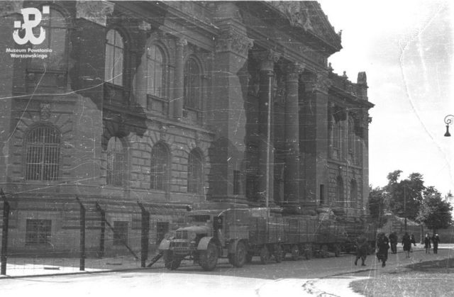 A Month before the Warsaw Uprising: Germans loading trucks with Polish artwork.
