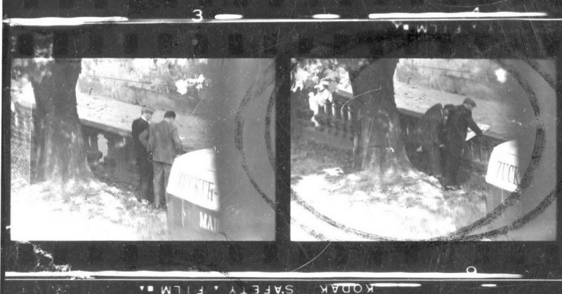 In the late 1950s, a German civilian working at USAF headquarters in Wiesbaden, Germany, photographed classified documents to pass to communist agents. OSI watched and photographed the whole process. The sequence of photos shows two communist agents innocently looking at a map, and one of them quickly grabs the film. Photo: USAAF.