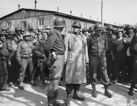General George S. Patton and General Omar Bradley during their tour of the newly liberated Ohrdruf concentration camp.