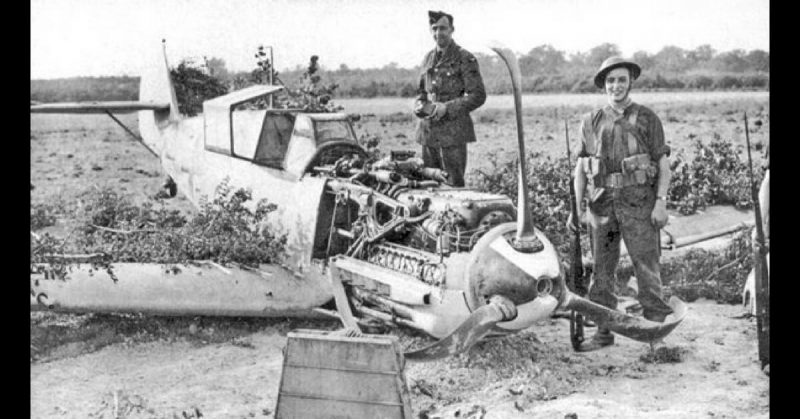 Soldiers pose with Werra's downed plane in Kent, England.