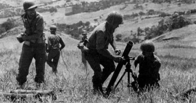 US troops of the 7th Army firing 81 mm mortars at Palermo. 