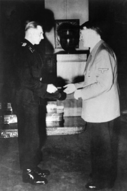 Wittmann receiving the Swords to his Knight’s Cross of the Iron Cross from Adolf Hitler. Photo: Bundesarchiv, Bild 146-1987-074-33 / CC-BY-SA 3.0.