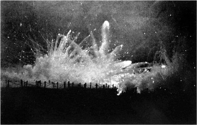 A German artillery barrage falling on Allied trenches at Ypres, probably during the Second Battle of Ypres in 1915, during the First World War.