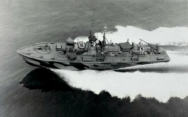 Photo depicts PT-601, a late Elco 80 footer skimming over the water. Notice the cannon on the front and aft deck and what seem the clamp installations on the sides that have replaced the launching tubes for the torpedoes. This type of launching was supposed to be less troublesome and didn’t give the flash that often accompanied the torpedo as they exited from the tube. In night operations, such flash was a very unwelcome position announcement that could attract instantly enemy fire.