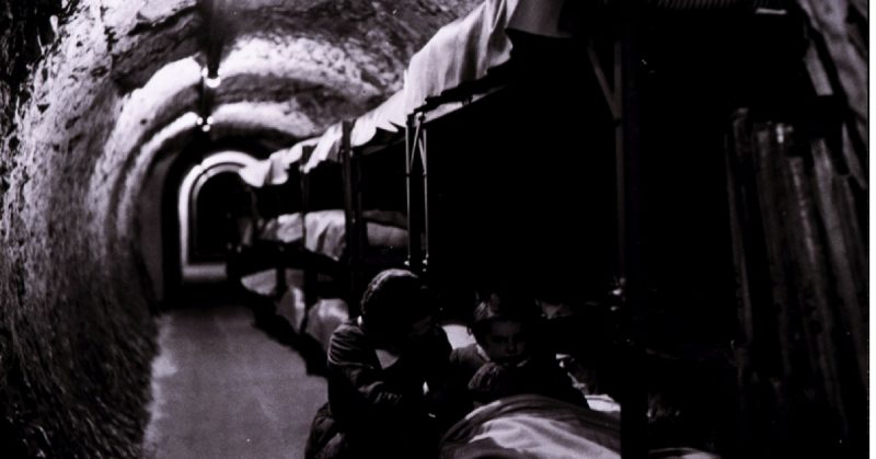 A mother and a young girl in a subway tunnel shelter, London, England, United Kingdom, 1940-1945.