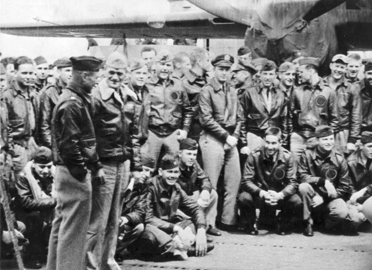 Orders in hand, Navy Capt. Marc A. Mitscher, skipper of the USS Hornet (CV-8) chats with Lt. Col. James Doolittle, leader of the Army Air Forces attack group. This group of fliers carried the battle of the Pacific to the heart of the Japanese empire with a daring raid on military targets in major Japanese cities. It was the result of coordination between the two services. The USS Hornet carried the 16 North American B-25 bombers to within take-off distances of the Japanese Islands. (U.S.Navy photo)