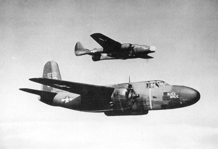 The first YP-61 Black Widow night fighter to arrive at Orlando Army Air Base, November 1943 is met by a 349th Night Fighter Squadron Douglas P-70 “Black Magic”.