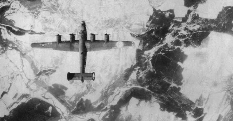 445 Formation: Seen from the air, a B-24 Liberator from Major Stewart's 445th Bomb Group attacks.