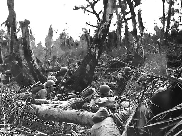 Marines dig in after hitting the beach