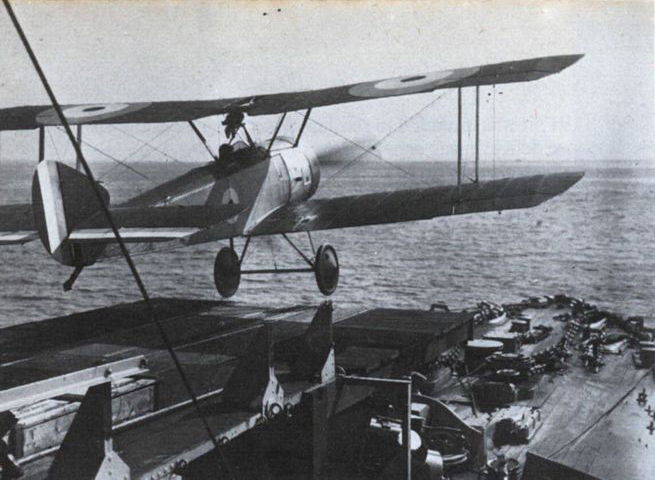 The Sopwith Pup of Flight Commander Rutland takes off from a platform on the forward gun turret of HMS Yarmouth, June 1917.