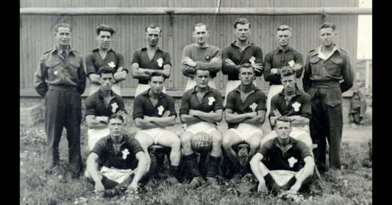 Prisoner of war Ron Jones (centre, back row) - the goalkeeper for the Welsh team in the Auschwitz football league.