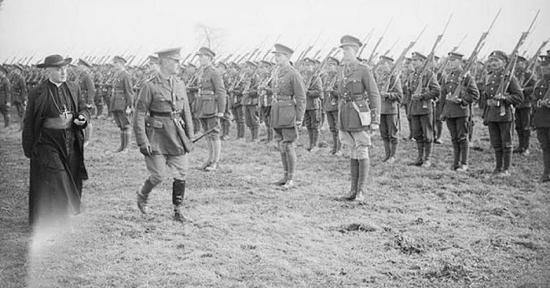 Cardinal Francis Bourne, the Head of the Catholic Church in England and Wales, and Major-General William Hickie, the Commander of the 16th Irish Division, inspecting troops of the 8/9th Battalion, Royal Dublin Fusiliers. 