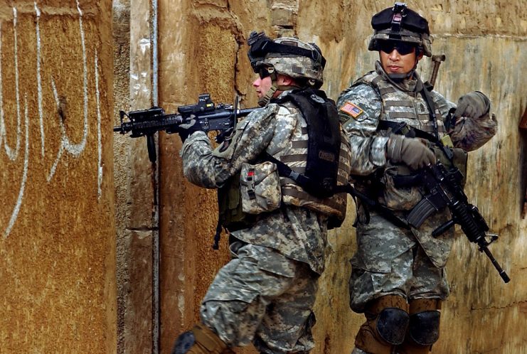 Cpl. Jared Jenkins and 1st.Sgt.Arthur Abiera, Apache Troop, 1st Squadron, 33rd Cavalry Regiment, 3rd Brigade Combat Team, 101st Airborne Division in Sadr City, Iraq.