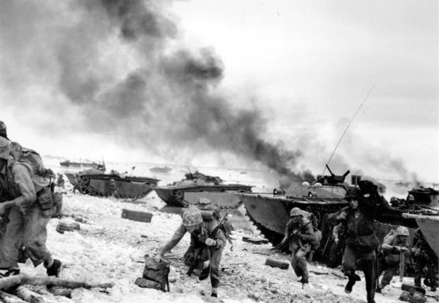 The Peleliu landing, showing Marines of the First Marine Division coming ashore in amtracs (Photo courtesy of U.S. National Archives)