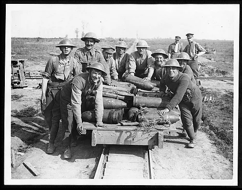 Royal Garrison Artillery gunners pushing a light railway truck filled with shells, behind Zillebeke, 1 October 1917.