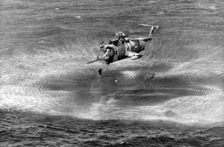 A U.S. Air Force Sikorsky HH-3E Jolly Green Giant rescues a pilot from the waters off the coast of Vietnam.