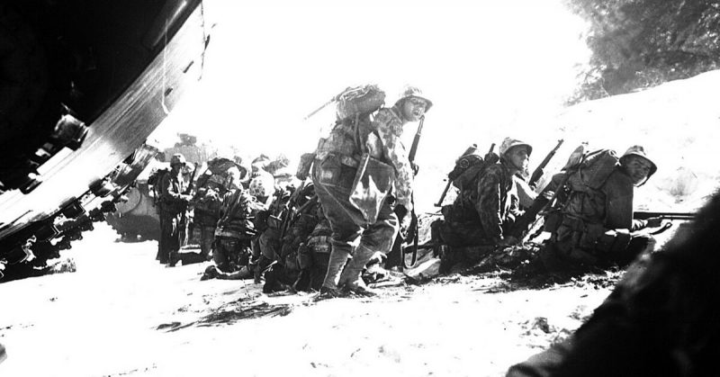 The first wave of the Marines hits the beach at Saipan. 