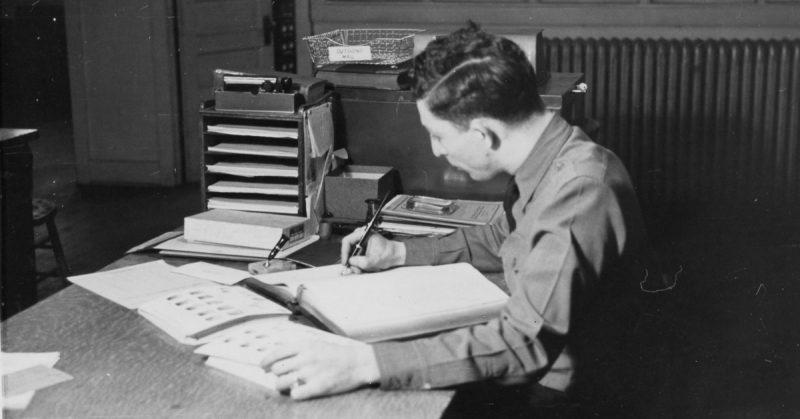 Trooper Ellis is pictured in the mid-1930s while working in the Fingerprint Division at the Missouri Highway Patrol Headquarters in Jefferson City. Courtesy of Missouri State Highway Patrol