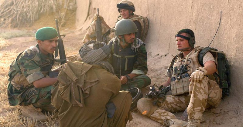 British Military talking with local Afghan forces in Afghanistan