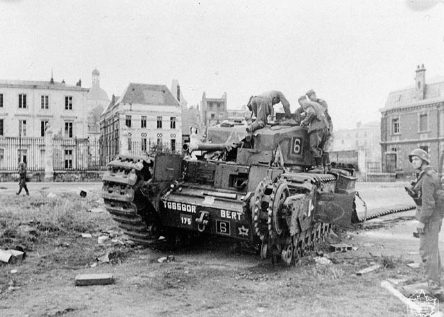 German soldiers examine a Canadian Churchill tank at Dieppe.