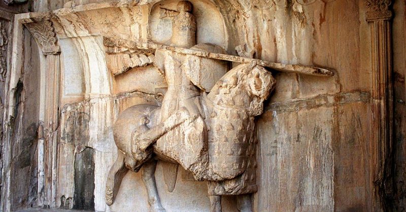 relief of a Cataphract, showing the armored horse and rider as well as the charging lance. By Philippe Chavin - CC BY 2.5