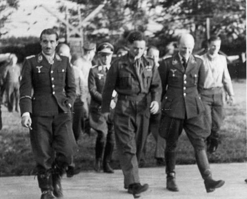 In August 1941 RAF pilot Douglas Bader was shot down over Le Tourquet and was captured. Bader was given full courtesy by the Luftwaffe fighter squadron that shot him down, and was allowed to sit in the cockpit of the ME 109. Pictured here is also Adolf Galland, who became a peacetime friend of Bader.