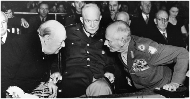 shown here at a reunion of the British Eighth Army on October 19, 1951. Churchill, leaning across a seemingly disgruntled Eisenhower