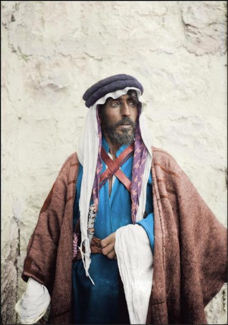 Bedouin Man, c1906-16. STUNNING photographs of the native Bedouin people of Palestine at the turn of the 20th Century have been brought to life in color. Among the images is a female ‘quack’ doctor in Jericho, known as such because she lacked legitimacy to practice medicine. Additional shots show a young man playing a bagpipe in the street, whilst another depicts a warrior on horse-back carrying a traditional Az-Zaġāyah hunting spear. The vivid color photographs are the work of French bank technician Frederic Duriez, from Angres, who caringly brought the photos into the 21st century. Frederic Duriez / mediadrumworld.com
